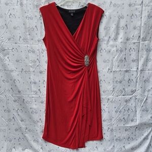 Infocus Red wrap dress with a V-neckline and decorative buckle detailing.